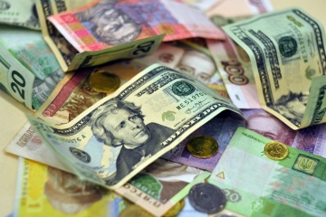 Нацбанк підвищив гривню до 26,24