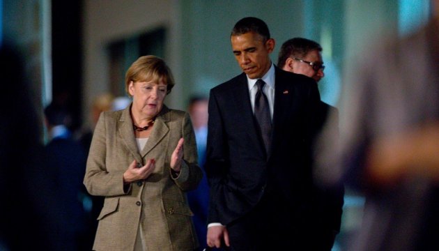 Obama y Merkel llamaron a iniciar la retirada de las fuerzas en el Donbás