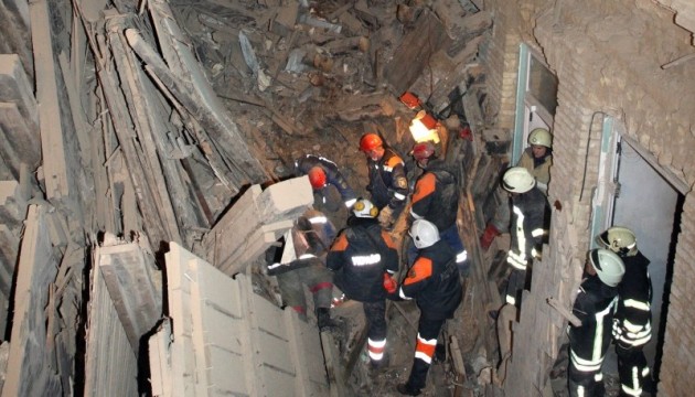 Four people may be trapped under debris from building in center of Kyiv 