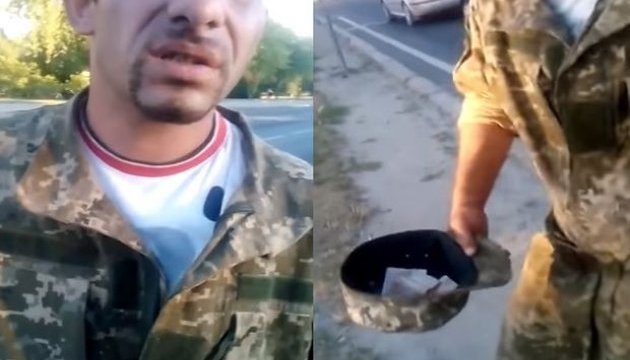У Львові боєць АТО змусив цигана-жебрака зняти форму ЗСУ