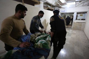 Число жертв химатаки режима Асада превысило 100, пострадавших - 500