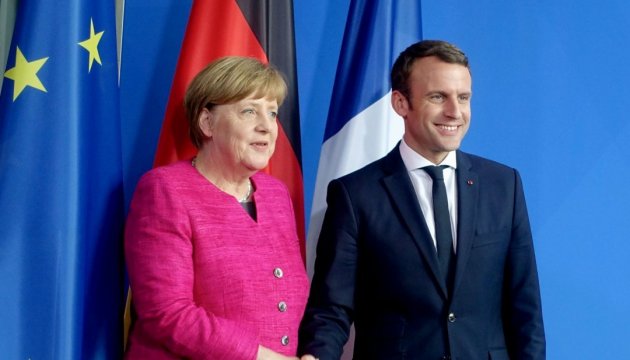 Merkel, Macron intend to promote political process in settlement of Ukrainian conflict