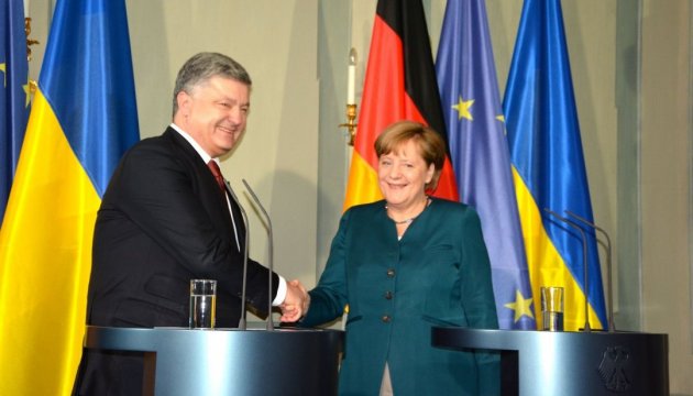 Poroschenko und Hrojsman gratulieren Merkel