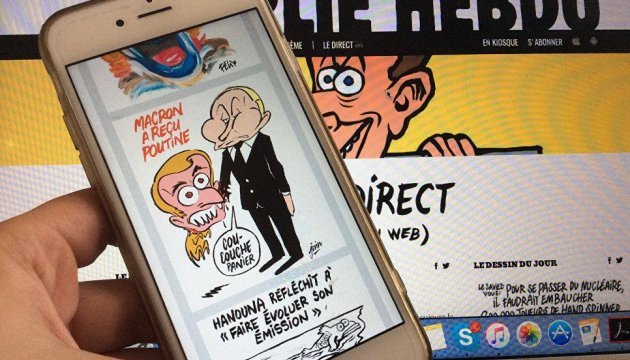 Журнал Charlie Hebdo зобразив зустріч Макрона та Путіна