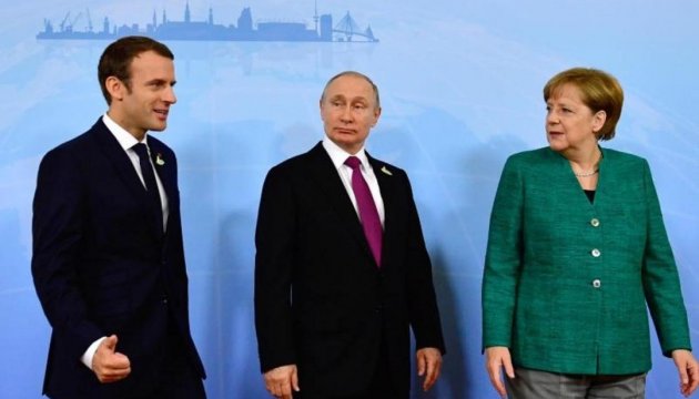 Merkel, Macron and Putin call for ceasefire in Donbas