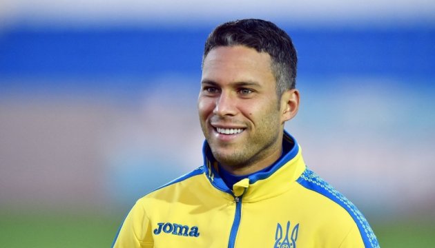 Marlos shows his Ukrainian passport