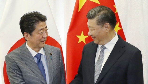 Прем’єр Японії спробує переконати КНР знизити напругу у відносинах з США