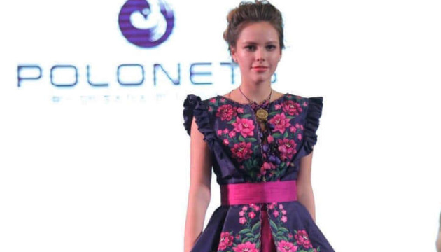 Ukrainian designer demonstrates embroidered dresses at fashion show in Bangkok. Photos