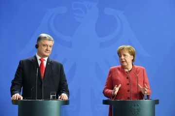 Poroschenko und Merkel unterstützten Waffenruhe für Ostern