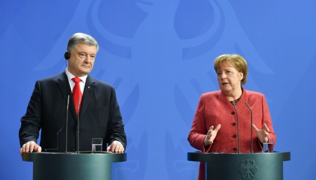 Порошенко подякував Меркель за можливість реабілітації військових у Німеччині
