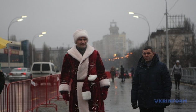 Kyiv mayor dressed as Santa Claus opens Shuliavsky overpass