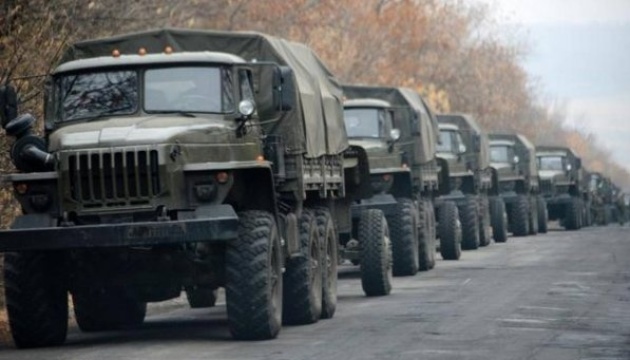 Russia delivers dozens of trucks with ammunition, armored vehicles to Donbas 