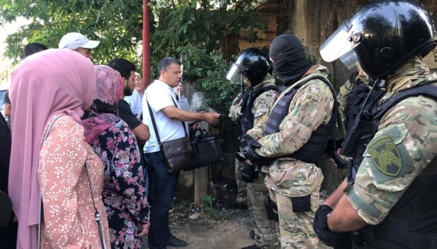 Seven Crimean Tatars detained after searches in occupied Crimea