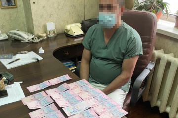 В Киеве врачи требовали взятку за выдачу тела умершей от COVID-19 в открытом гробу