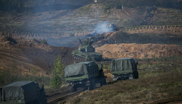 Russia withdraws portion of troops from border with Ukraine