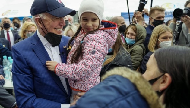 Biden calls Putin 'a butcher' after meeting with Ukrainian refugees in Poland