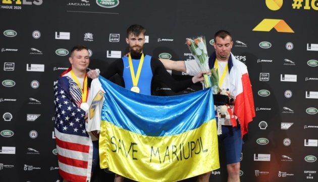 Ukrainian vet unfurls Save Mariupol flag at Invictus Games podium