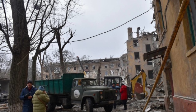 Emergency workers clearing rubble after Russian missile hit residential building in Kramatorsk 