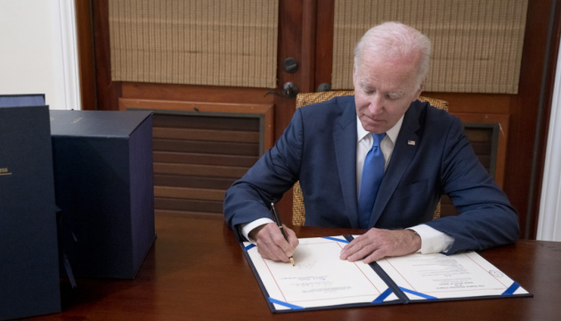 Biden signs Ukraine aid bill into law