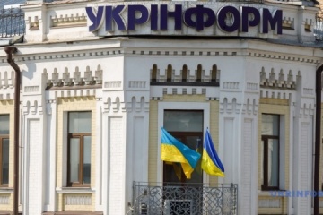 Ukrainian flags, signed by defenders in Kursk region, raised at Ukrinform on National Flag Day