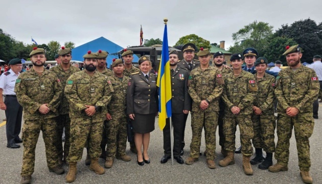 Ukrainians participate in the Warriors’ Day Parade in Toronto, the first