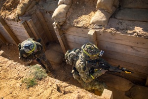 Future Ukrainian commanders improving trench assault skills in UK training