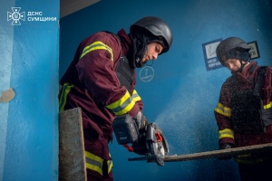 Rescuers eliminate consequences of Russian attack on dormitory in Sumy