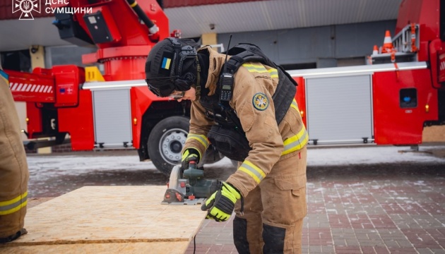 Rescuers eliminate consequences of Russian attack on dormitory in Sumy