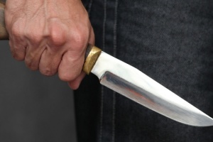 In Kyiv, soldier looking for treatment after being wounded attacked with knife