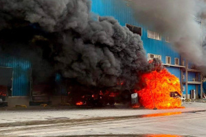 Russians strike Dnipro, logistics company warehouse on fire 