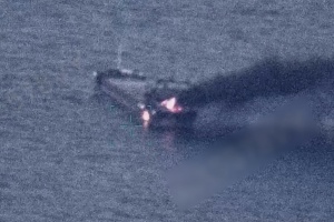 Russian drones strike two ships bound for Ukrainian ports, one killed