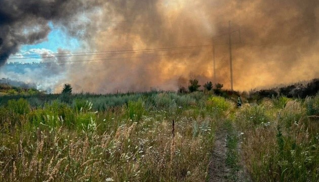 Firefighters battling large landfill blaze in Kyiv region for second day