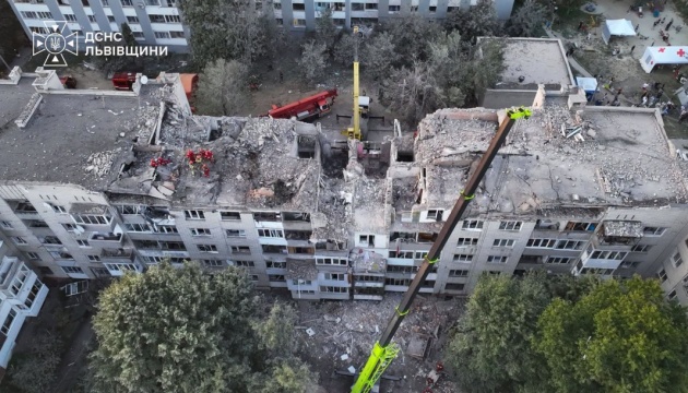 Two people may still be trapped under rubble after Russian missile strike on Lviv