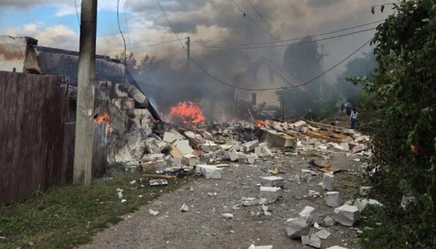 Russian attacks damage homes, set business ablaze in three districts of Kyiv region